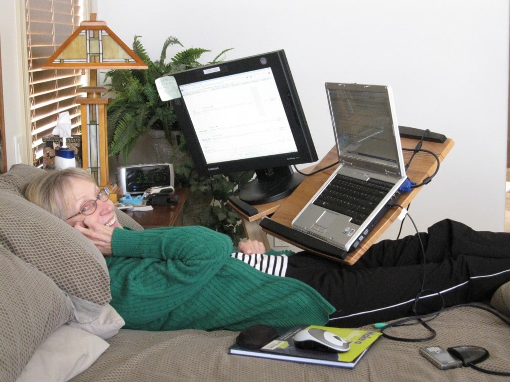 Sonja with her hospital table and laptop