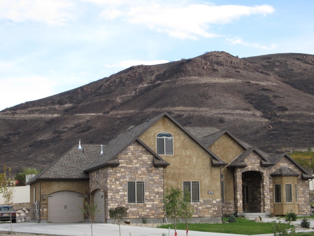 Side of a hill after the fire in Herriman, it should be gold, red and green not all burnt!