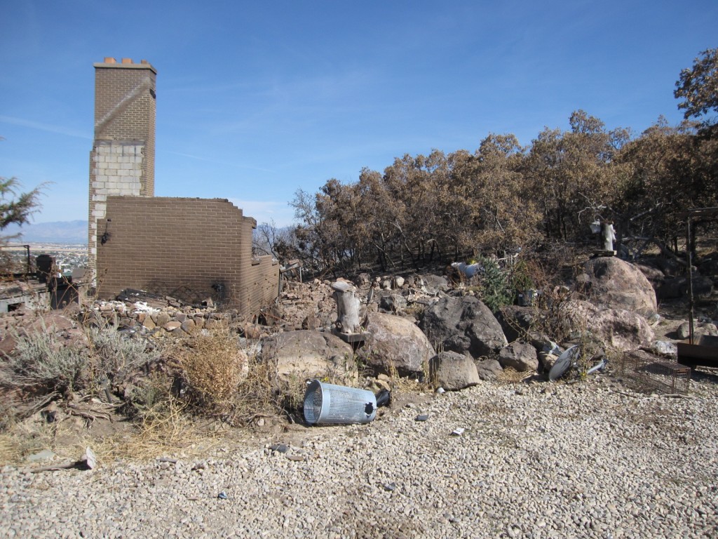 Crumbling walls of a house after the fire in Herriman