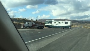 Our poor motor home getting towed.